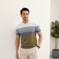 Portrait of David Chen, a man wearing a dark knit pullover, smiling confidently against a soft, cream-tinted background.